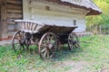 Ancient wagon Ukrainian peasants near the house