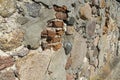 ancient wall of cobblestones and red bricks Royalty Free Stock Photo