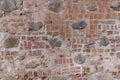 ancient wall of cobblestones and red bricks Royalty Free Stock Photo