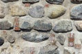 ancient wall of cobblestones and red bricks Royalty Free Stock Photo