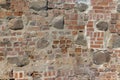 ancient wall of cobblestones and red bricks Royalty Free Stock Photo