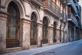 Ancient wall with decorative windows while traveling through the streets in Spain Architecture