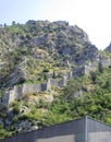 Ancient Wall rises on the mountain to the Fortress St Jons over Kotor in Montenegro Royalty Free Stock Photo