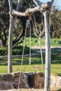 Ancient water well with a bucket Royalty Free Stock Photo