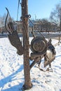 Bow and arrows. Saddle and stirrups for riding. Antiquities sculpture