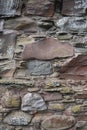 Ancient weathered stone wall with lichen Royalty Free Stock Photo