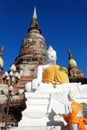 Ancient white buddha statues and ruined pagoda,Thailand