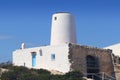 Ancient white salt windmill Formentera