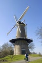 Ancient windmill the Prince of Orange and biker, Buren