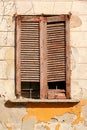 Ancient window broken disused aged detail particular old Italy Italian brown color shutter Royalty Free Stock Photo