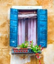 Ancient window with shutters