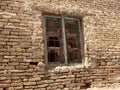 Aged Window in a Brick Wall