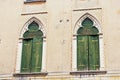 Ancient Windows with Arch in Venetian Gothic style - Oderzo Treviso Italy Royalty Free Stock Photo