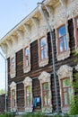 Ancient wood carving on the house in daylight against the blue sky Royalty Free Stock Photo