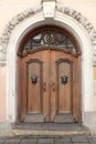 Ancient wooden arched door in Tallinn, excursion, Estonia Royalty Free Stock Photo