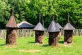 Ancient wooden beehives in old rural apiary Royalty Free Stock Photo