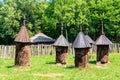 Ancient wooden beehives in old rural apiary Royalty Free Stock Photo