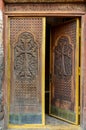 Ancient wooden door. Facade of the temple Armenia.