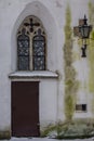 Ancient wooden door in the historic church in Tallinn`s Old Town in winter. Estonia Royalty Free Stock Photo