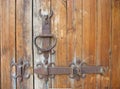 Ancient wooden door rustic metallic detail Royalty Free Stock Photo