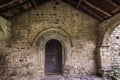 Ancient wooden door of Sant Feliu church in Barruera, Catalonia, Spain. Royalty Free Stock Photo