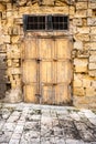 Ancient wooden door in Valletta on Malta Island Royalty Free Stock Photo