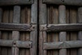 Ancient wooden gate with metal ornaments Royalty Free Stock Photo