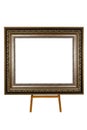 Ancient wooden photo frame on easel isolated on white Royalty Free Stock Photo