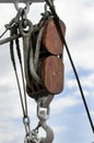 Ancient wooden sailboat pulley and ropes Royalty Free Stock Photo