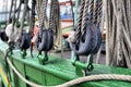 Ancient wooden sailboat pulleys