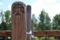 Ancient wooden slavic pagan idol of god. Heathen temple in the forest