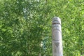 Ancient wooden slavic pagan idol of god. Heathen temple in the forest