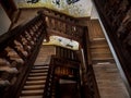 Ancient wooden staircase in old timber-framing rich house XV century Royalty Free Stock Photo