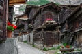 Ancient wooden traditional Swiss raccard granary on stone piles in old Hinterdorf quarter Zermatt Switzerland Royalty Free Stock Photo