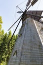 Ancient wooden windmill with large blades Royalty Free Stock Photo