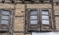 Ancient wooden window with the old brick wall exterior home architecture retro decoration at old town Kashmir, India. Antique Royalty Free Stock Photo