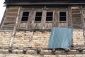 Ancient wooden window with the old brick wall exterior home architecture retro decoration at old town Kashmir, India. Antique Royalty Free Stock Photo