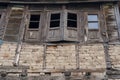 Ancient wooden window with the old brick wall exterior home architecture retro decoration at old town Kashmir, India. Antique Royalty Free Stock Photo