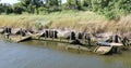 Wreck of a sunken wooden boat in the lagoon water