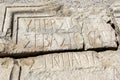 Ancient writing on a stone at Jarash in Jordan.