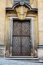 Ancient wrought iron gates and doors .