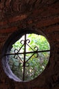 Ancient wrought iron round window