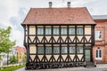 An ancient yellow half-timbered house in the old quarters of Svendborg