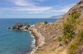 Andalusia`s rocky coast east of Motril on a warm summer day.