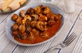 Andalusian style caracoles stewed with spicy tomato salsa Royalty Free Stock Photo