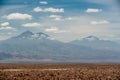 Ande Mountains and Lake Chaxa near San Pedro de Atacama, Chile. Chaxa Lagoon, Atakama Salar, Chile : Unusual landscape of salt Royalty Free Stock Photo