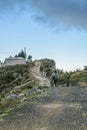 Andean Native Walking at Road Quilotoa Ecuador