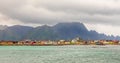 Andenes village panorama with multiple houses and mountains in the background, Lofoten islands, Andoy Municipality, Vesteralen