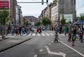Anderlecht, Brussels Capital Region, Belgium - Children on bikes and pedestrian adults during the car free sunday at the