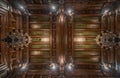 Anderlecht, Brussels Capital Region - Belgium - Decorated ceiling with wood and vintage chandeliers